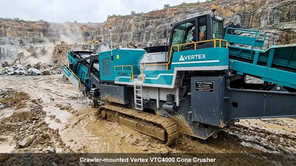 Crawler-mounted Vertex VTC4000 maneuvering across 400mm deep monsoon mud to reach the active blast face, demonstrating ground bearing pressure advantages.